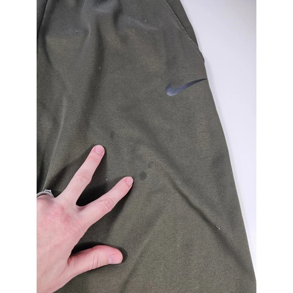 Nike fleece lined green warm sweatpants size XL men's (FLAWS)